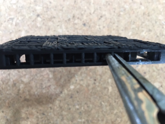 Removing supports with pliers on 3d printed floor tile