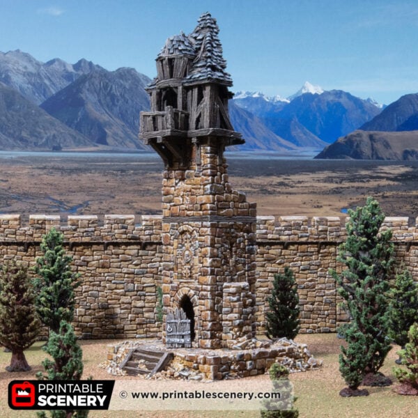 3D printed and painted ruined millbury tower against a mountain backdrop, for dnd and wargames