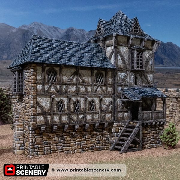 3D printed and painted Wattle & Daub Living Quarters model for wargames and rpgs on a mountain backdrop