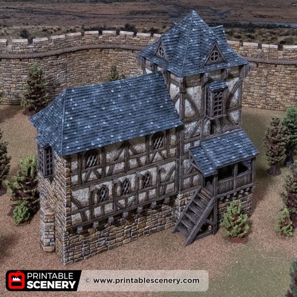 3D printed and painted Wattle & Daub Living Quarters model for wargames and rpgs on a mountain backdrop