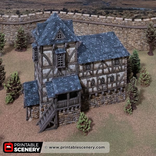 3D printed and painted Wattle & Daub Living Quarters model for wargames and rpgs on a mountain backdrop