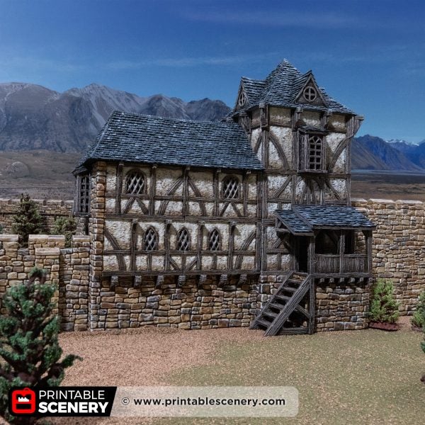 3D printed and painted Wattle & Daub Living Quarters model for wargames and rpgs on a mountain backdrop