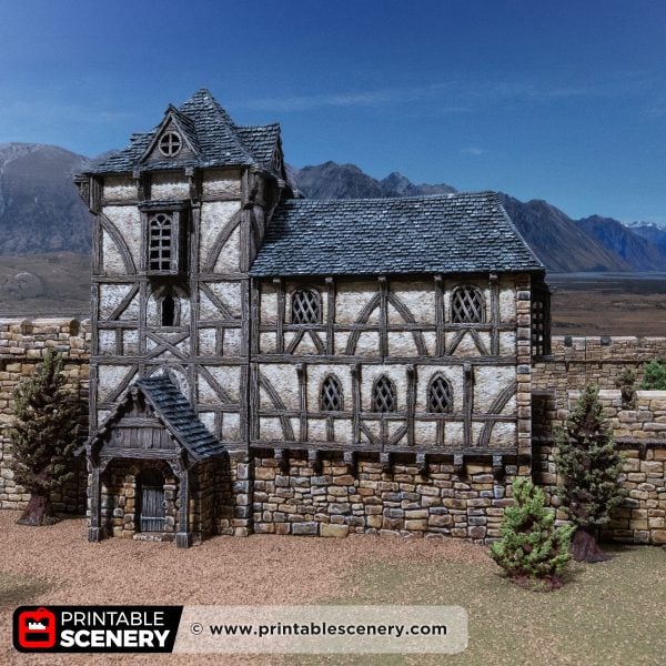 3D printed and painted Wattle & Daub Living Quarters model for wargames and rpgs on a mountain backdrop