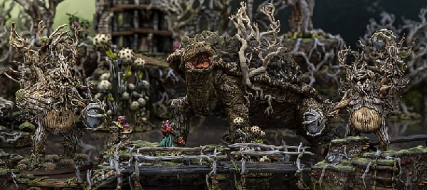 Fantasy 3D printed models of swampy terrain and monsters, giant turtles and tree creatures in a gloomy atmosphere