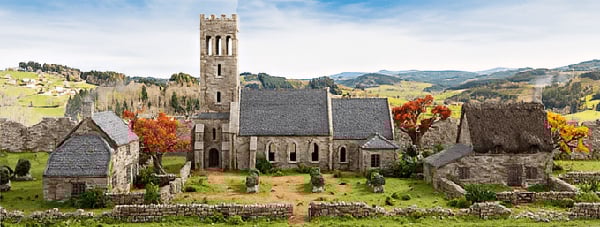 Historical Inspired 3D print of a Norman church building and terrain for wargaming with a sunny Autumn backdrop