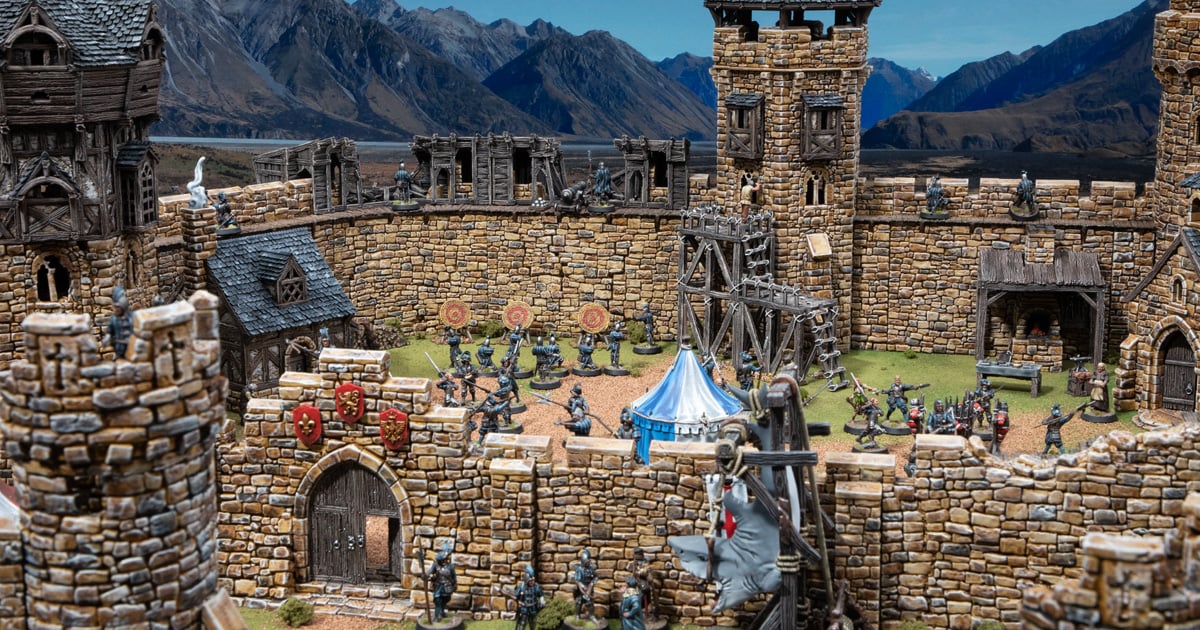 3d printed and painted castle scaffolds and ruined wall hoardings for dnd and wargaming