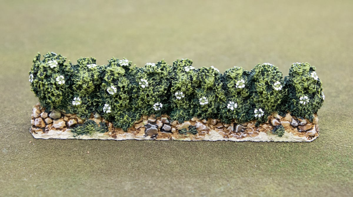 Painting white flowers on 3d printable castle hedges