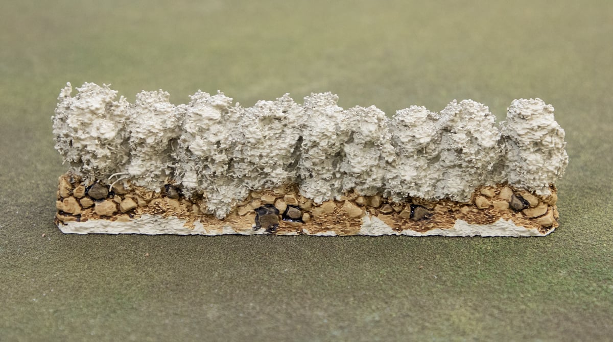 Picking out bricks with black wash on 3d printable castle hedges