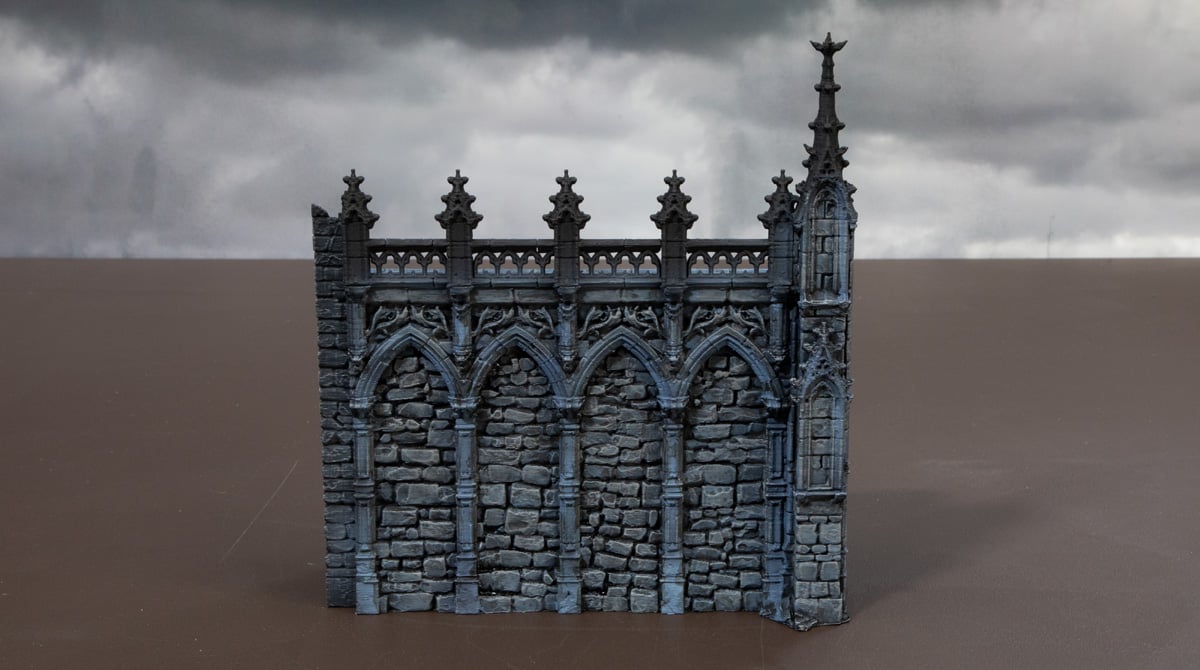 3D printed gothic wall drybrushed with dawnstone