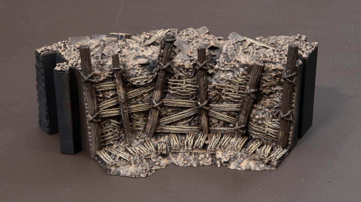 3D printed Trench Wall with wood planks drybrushed with Zandri Dust